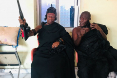 Nana Owusu Korkor II with rifle at coronation festivities (rifle swearing)