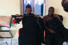 Nana Owusu Korkor II with rifle at coronation festivities (rifle swearing)