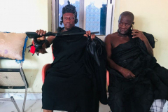 Nana Owusu Korkor II with rifle at coronation festivities (rifle swearing)